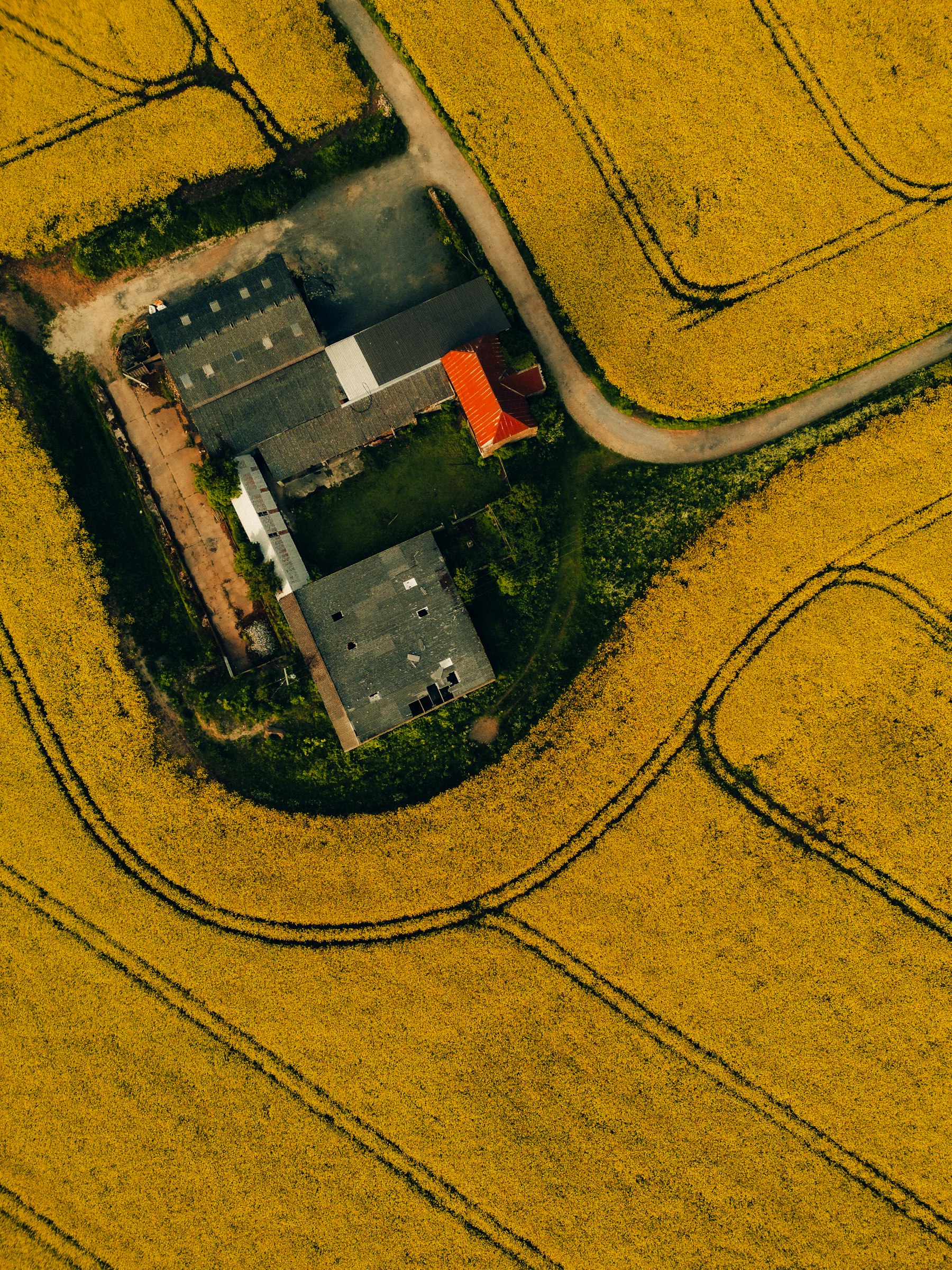 Aerial view of a farm and road in the Cotswolds
