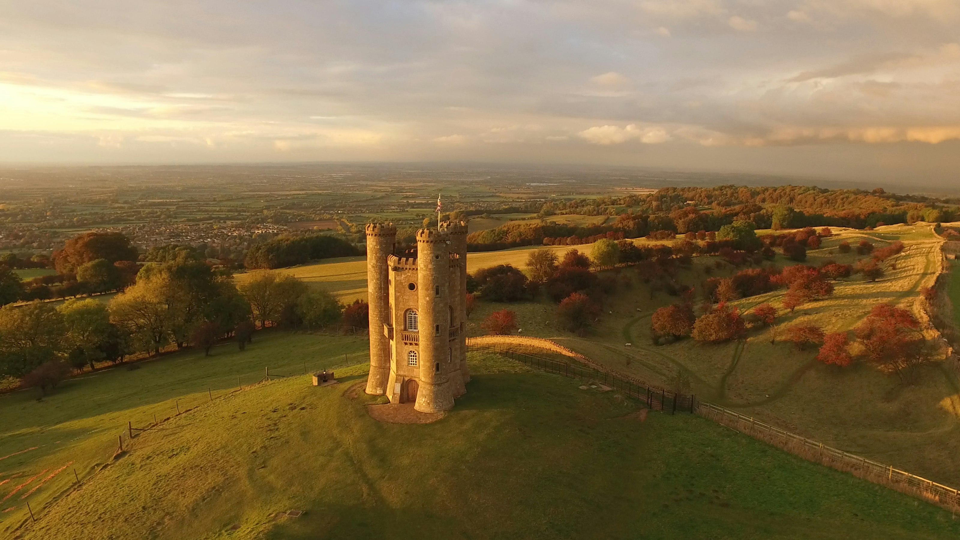 Broadway Tower standing on a hill in the Cotswolds at sunset